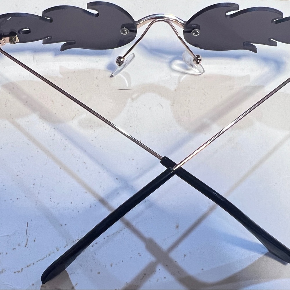 Unique Flame Shaped Sunglasses - image 1